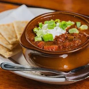 Venison Chili -  Topped with sour cream, scallions