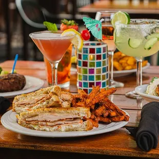 Turkey Reuben - Smoked turkey, Swiss cheese and coleslaw on grilled rye bread.