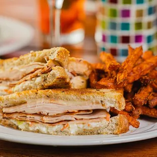 Turkey Reuben --  Smoked turkey, Swiss cheese and coleslaw on grilled rye bread.