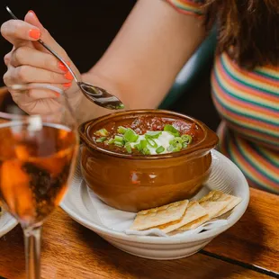 Venison Chili -  Topped with sour cream, scallions