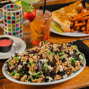 Bleu Cheese Harvest Salad -- Mixed wild greens topped with Traverse City dried cherries, walnuts, bleu cheese, and raspberry vinaigrette
