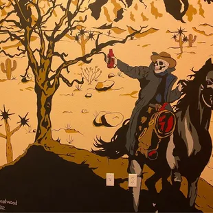 a man riding a horse with a dead tree in the background