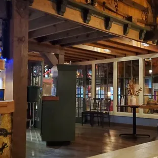 the inside of a rustic restaurant