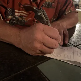 Even the pen to sign check was in costume