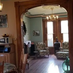 a view of a living room and dining room