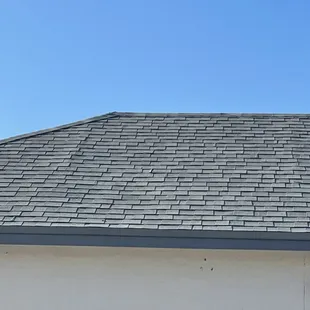 Buckling shingles on every section of roof of Delton's and Lucinda's Deal2Deal custom home.