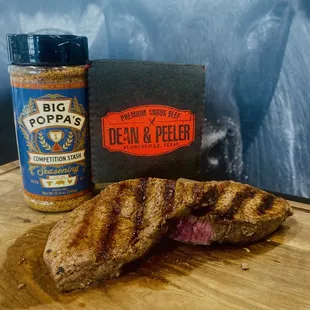 a grilled steak on a cutting board