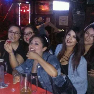 At the bar with the girls drinking