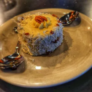 a plate of food with spoons