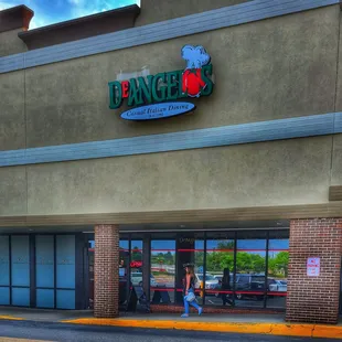 The outside entrance to D'Angelo nicely nestled between DSW warehouse and the nail apa in college town mall.