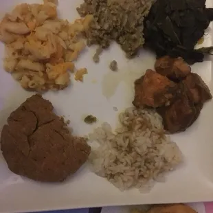 Salmon croquette with rice &amp; gravy, Mac &amp; cheese, cornbread dressing, sweet potatoes &amp; collard greens.