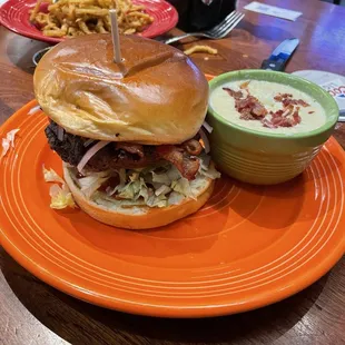 Classic Burger and corn chowder (shoelace onions in back)