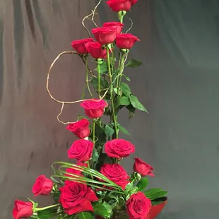 Send roses that won't be forgotten! Stylized rose arrangements will grab their attention!