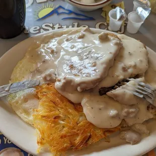 Chicken fried steak with fresh country gravy, eggs over easy and the best hash browns on the planet.