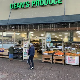 a man walking in front of a store