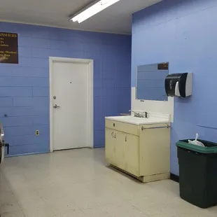 Sink and paper towel dispenser