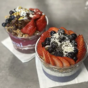Ube/coconut base with chia pudding, chia seeds, almonds, toasted coconut, blueberries, strawberries, topped with agave.