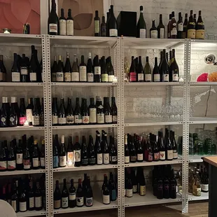 shelves of wine in a wine shop