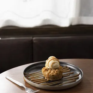 Apple Cobbler | caramelized apples, cinnamon streusel, vanilla ice cream