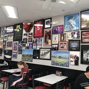 a wall of sports memorabilia