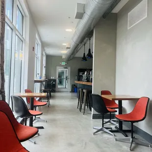 ables and chairs in a coffee shop