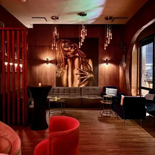 a living room with a view of the city