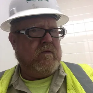 a man wearing a hard hat