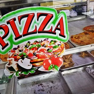 a display of pizzas for sale