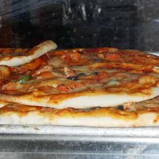 Several varieties of pizza bread