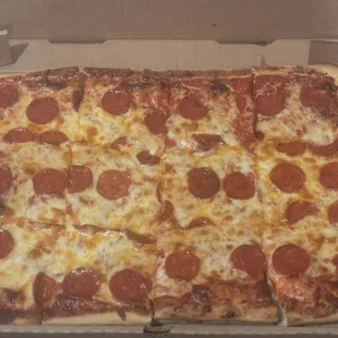 Large pizza with halal pepperoni