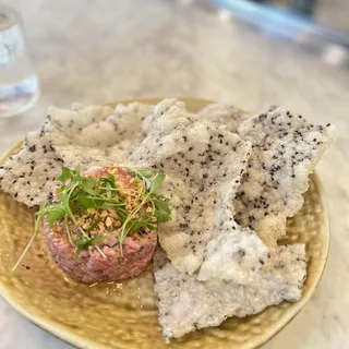 Beef Tartare, Red Curry, Smoked Peanuts, Sesame Rice Chip