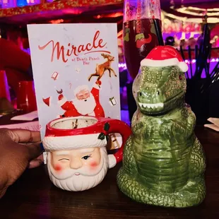 a christmas drink and a book on a table