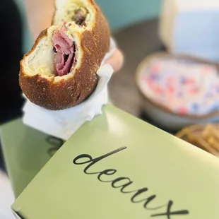 -Bacon, date, fig, and goat cheese sandwich donut -Pastrami sandwich donut