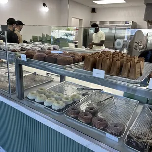 a variety of donuts in a bakery