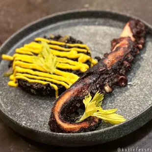 Grilled octopus with black rice