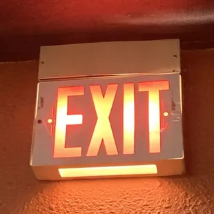 Thai restaurant vintage exit red and orange 1970s 1:11 pm march 2 2025