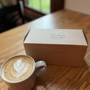 Vanilla Latte. Boxed treats include a snickerdoodle cookie, oatmeal raisin cookie, and a cinnamon roll.