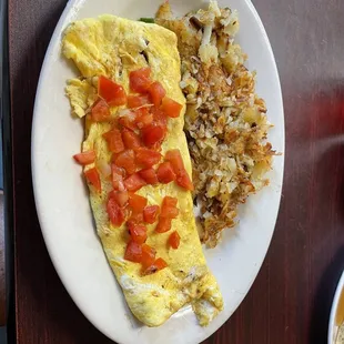 Ham Omelette with tomato and hash browns