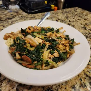 Beans and Greens with sausage and chicken over pasta