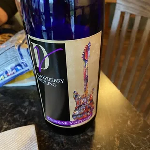 a bottle of wine on a table