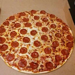 a pepperoni pizza in a box