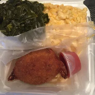 Crab cake entree with Collard Greens and Mac &apos;n Cheese