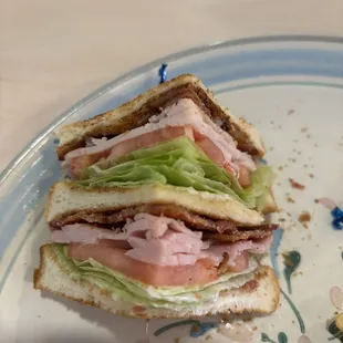 a half eaten sandwich