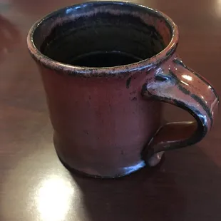 a coffee cup on a table