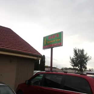 cars parked in front of a building