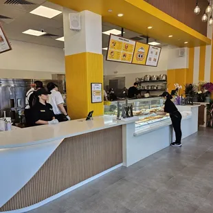 Interior - get a tray and select your own, take it to the next area for torching, then go to the cashier