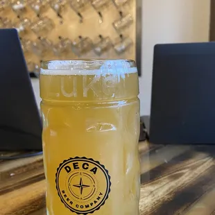 a glass of deca beer