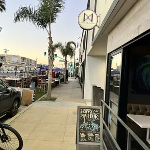 a bicycle parked in front of a restaurant