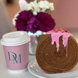 a cup of coffee and a cake