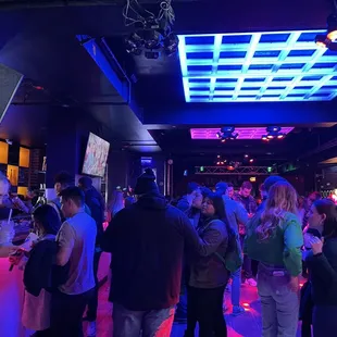 a crowd of people at a party